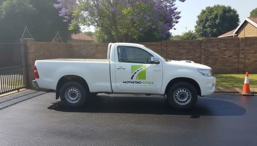 Mothetho Civils branded Hilux parked at a freshly tarred Randburg driveway