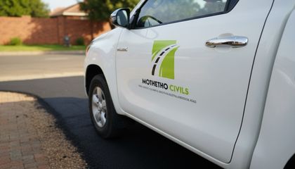 Mothetho Civils branded contractor truck on site at a Randburg driveway tarring job